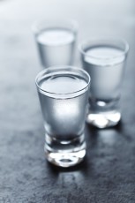 Shot glasses of cold vodka