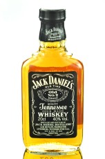 Small bottle of Jack Daniels whiskey isolated on white backgroun